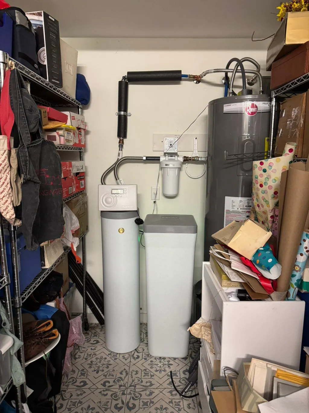 Water heater beside two water softener tanks
